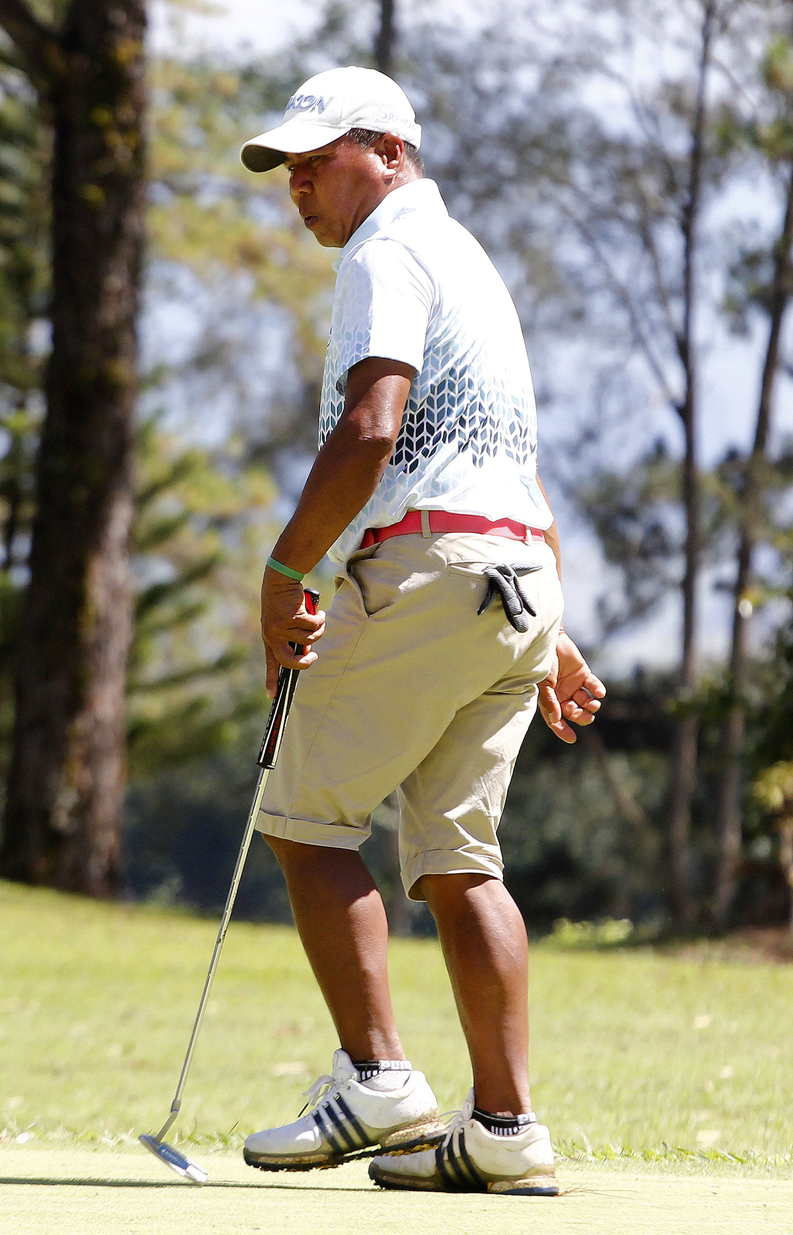 Crispin Aparilla holding a golf club