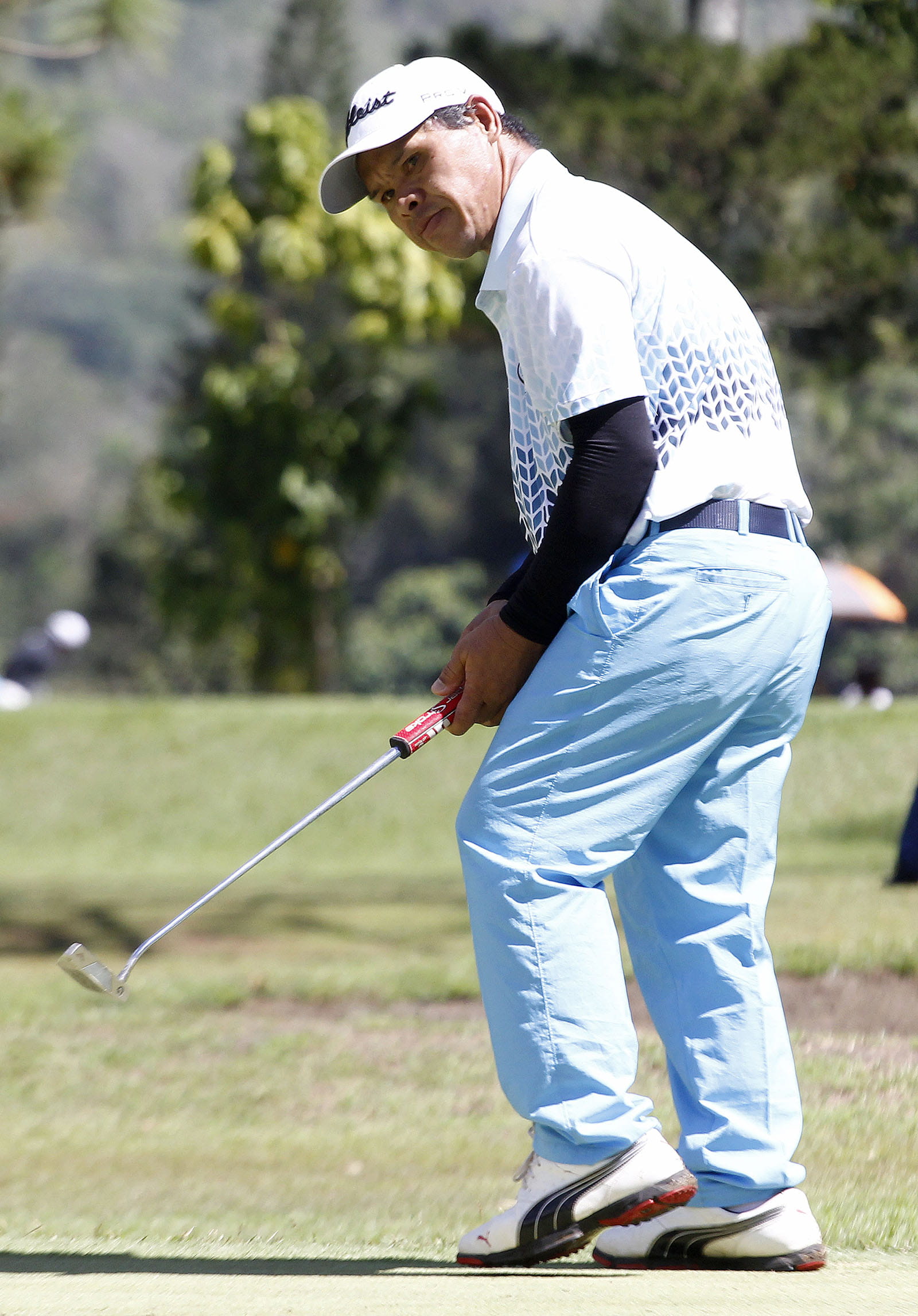 Romeo Jaraula holding a golf club